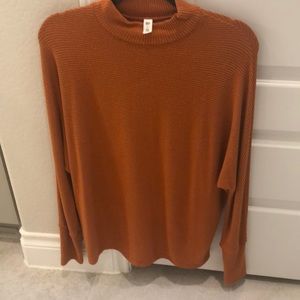 Burnt Orange sweater.